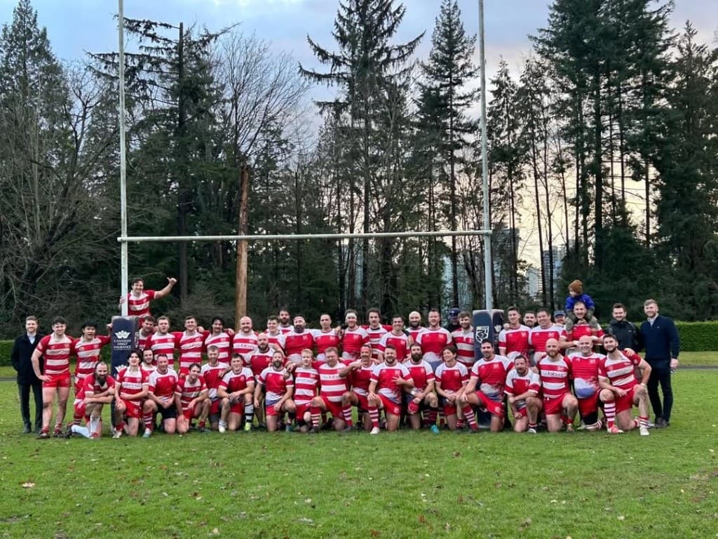The full Vancouver Rowing Club men's senior squad lined up in front of the rugby posts at Brockton Oval, Stanley Park